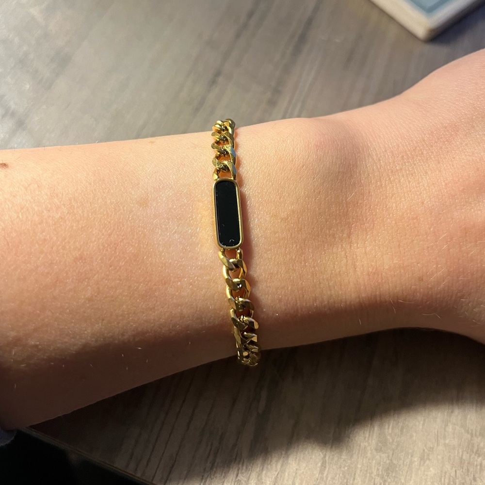 Gold and black bracelet